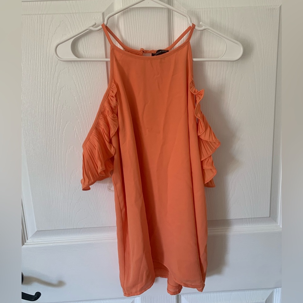 Orange flowy top with off the shoulder flutter sleeves